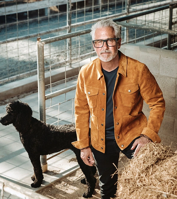 Dr. Rob Santos portrait with his dog